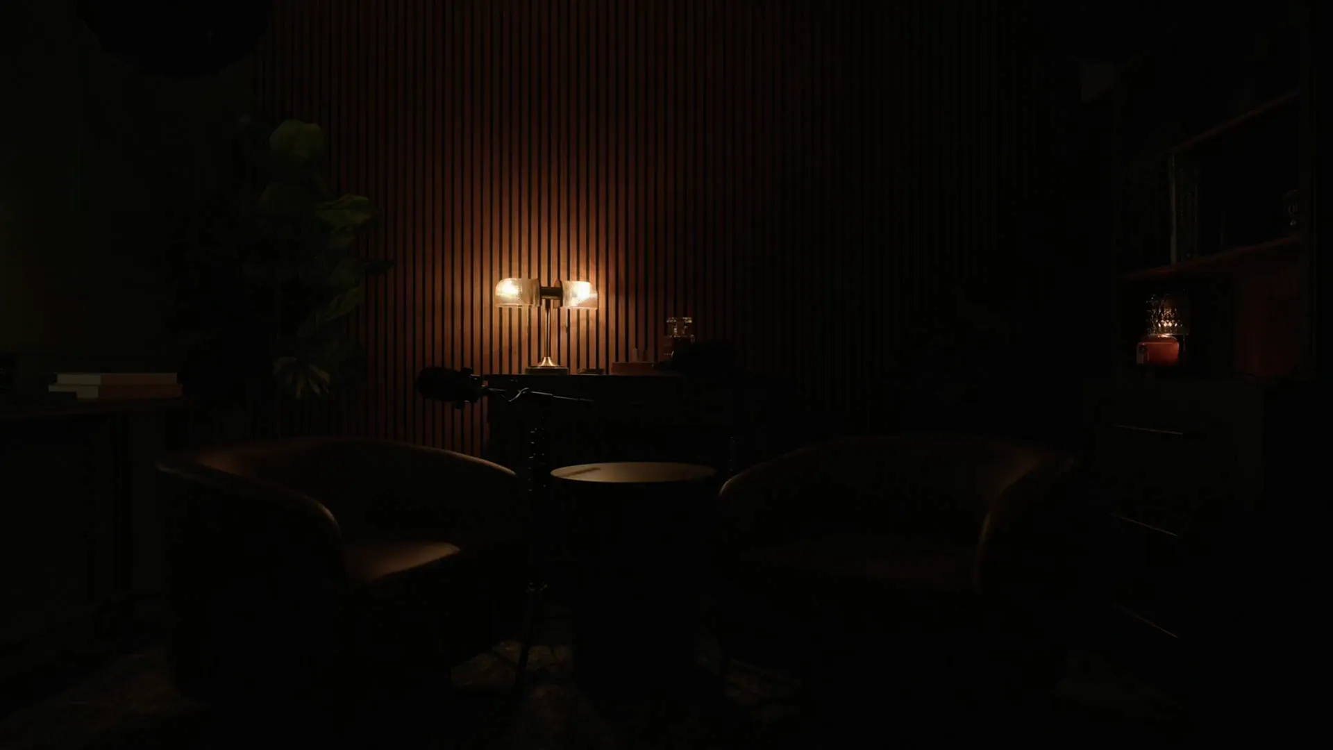 Pod Bros podcast studio with two leather chairs and professional microphones